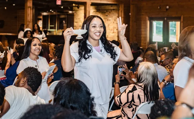 Herzing Nashville nursing graduate smiling during commencement ceremony