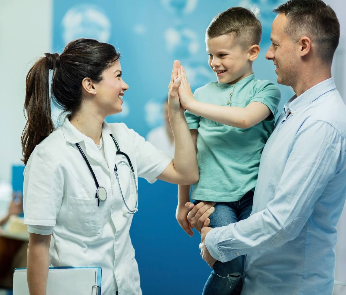 APRN with Post Master's Certificate High Fiving Child Patient
