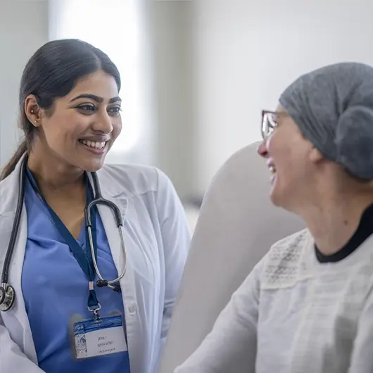 Women's Health Nurse Practitioner with patient