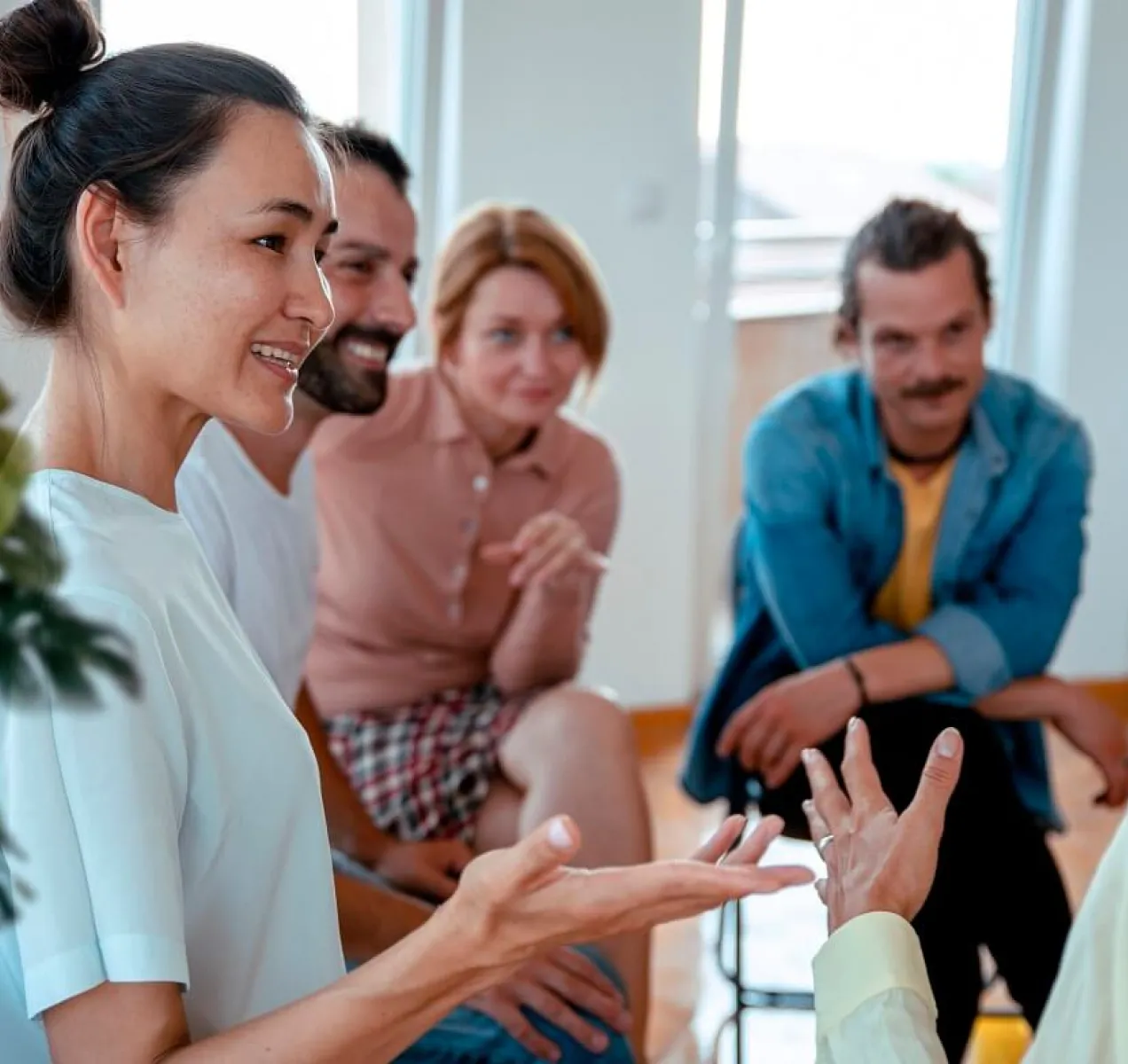 Community Health Worker Discussing Healthcare with Patients Community Health Worker in Group Session