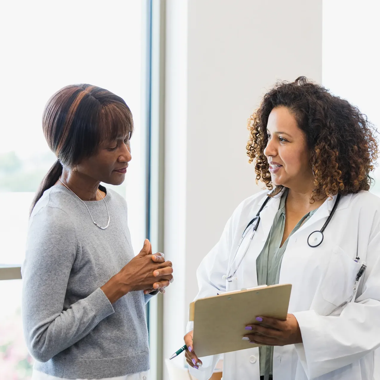 Adult Gerontology Acute Care Nurse Practitioner Who Went from BSN to AGACNP Treating Patient