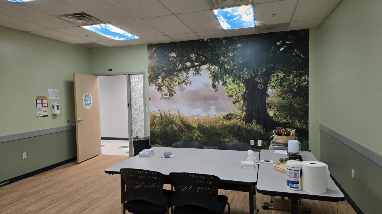 Herzing University Akron student wellness lounge with calming mural and study space