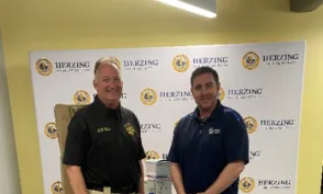 Herzing-New Orleans Campus President Jamie Hardage with Chief Stephen Schmitt 