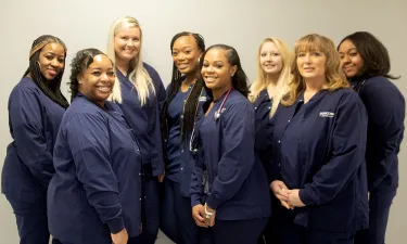 Herzing medical assistant students gather to pose for a group photo