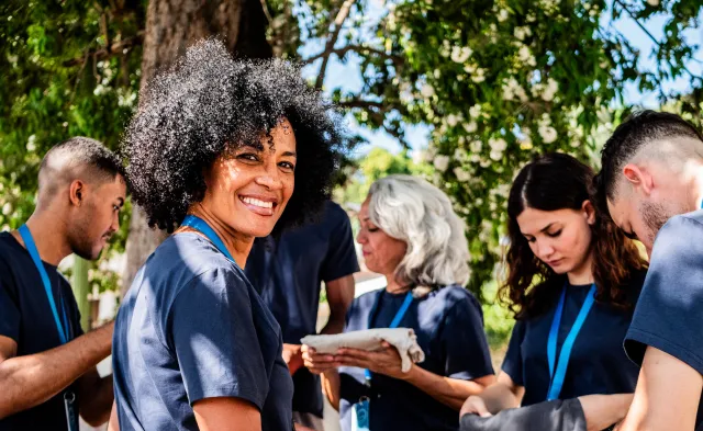 Portrait of mature volunteer woman outdoors