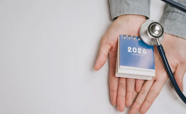 2026 calendar with stethoscope on open hand