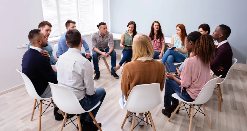 Social Worker Leading Group Discussion