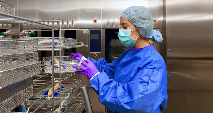 Sterile Processing Technician Cleaning Medical Instruments