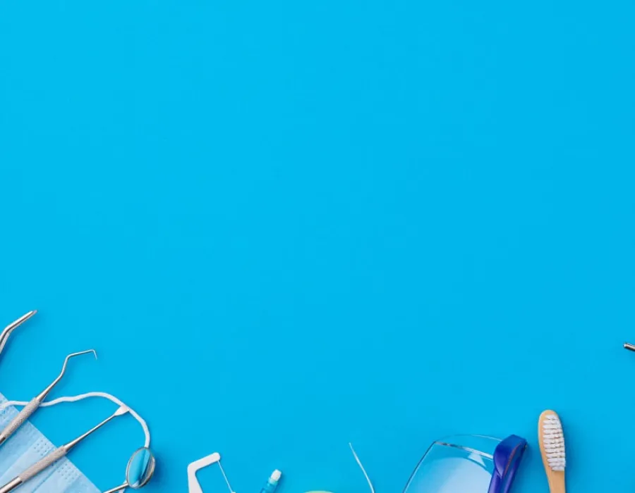 Several dental tools resting on a tabletop