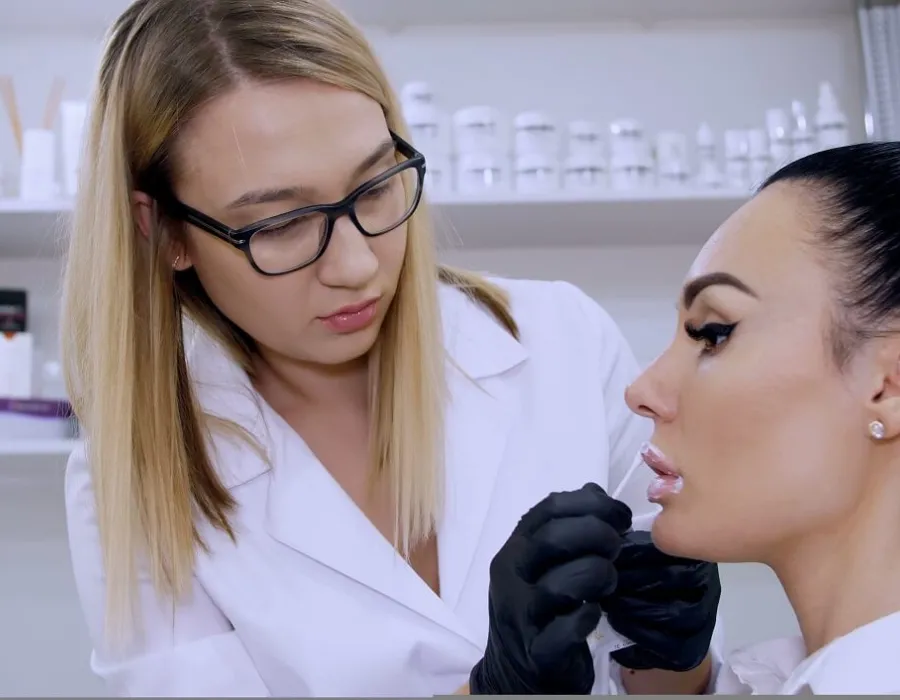 Cosmetic Registered Nurse Preparing Patient for Lip Procedure