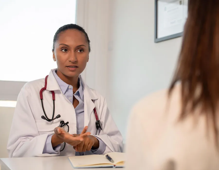 Nurse Practitioner Discussing Treatment Options with Patient