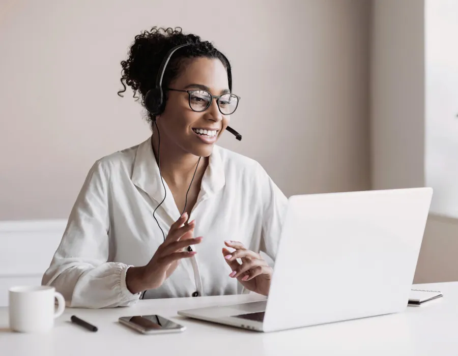 Billing and Coding Student Learning Online at Home on Laptop